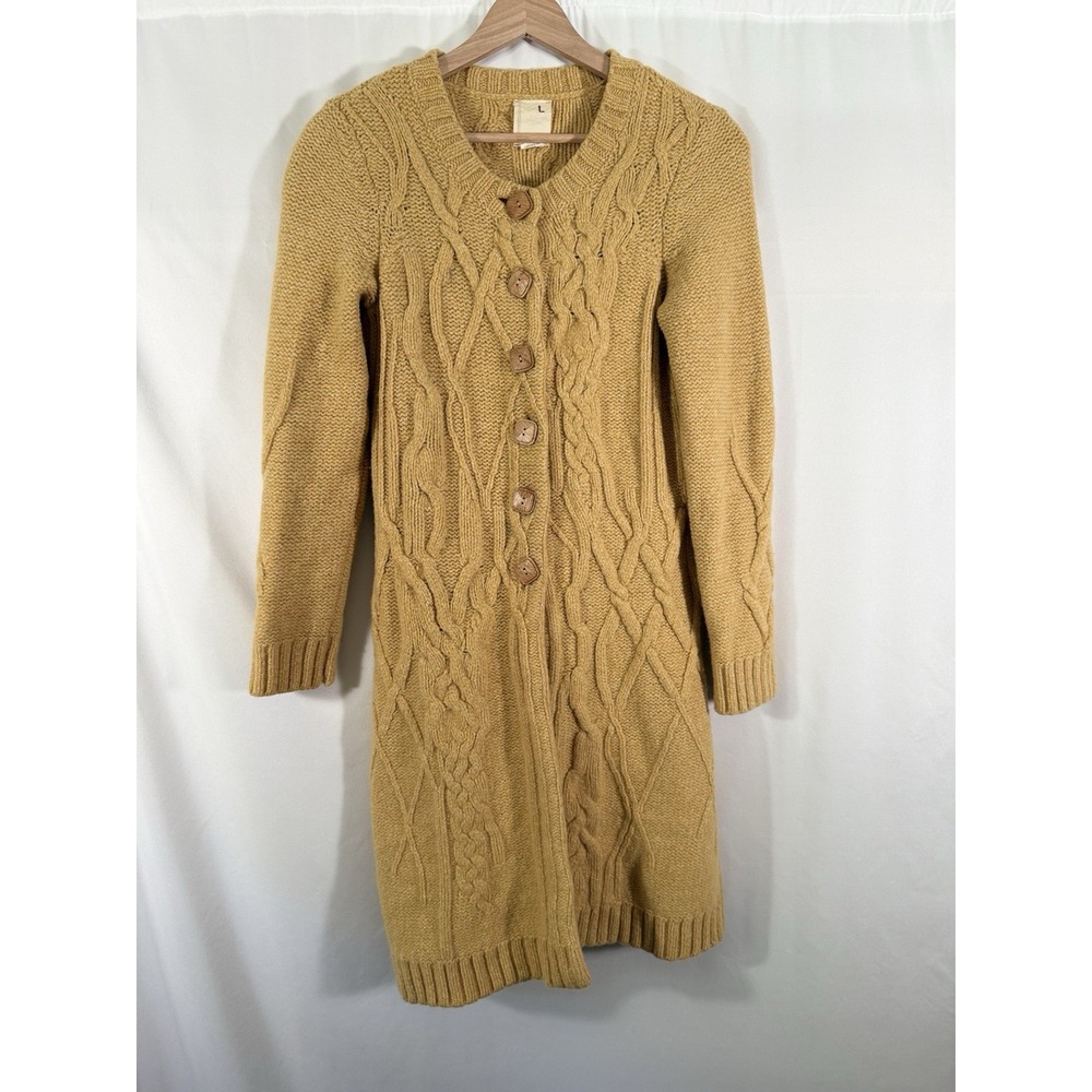 Anthropologie Gold Cable Knit Cardigan
“far away from close”